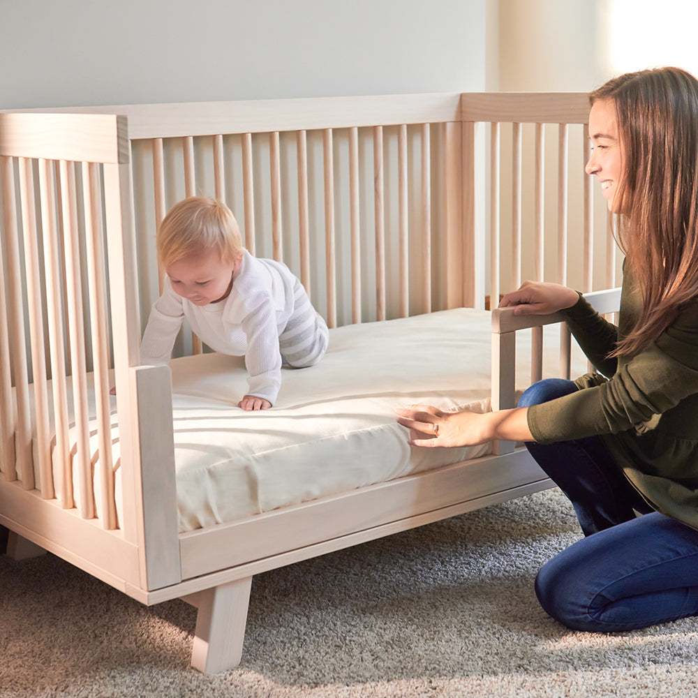 How to choose a safe crib mattress protector — checklist