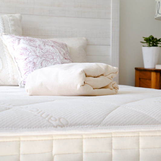 Naturepedic Organic Waterproof Mattress Pad Protector Folded Lifestyle MADE SAFE